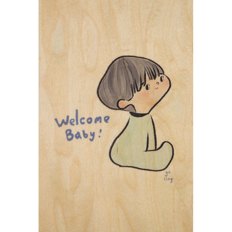 Carte en bois avec un dessin de bébé.